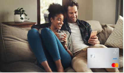 couple online shopping on couch