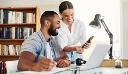 Couple working on taxes at home